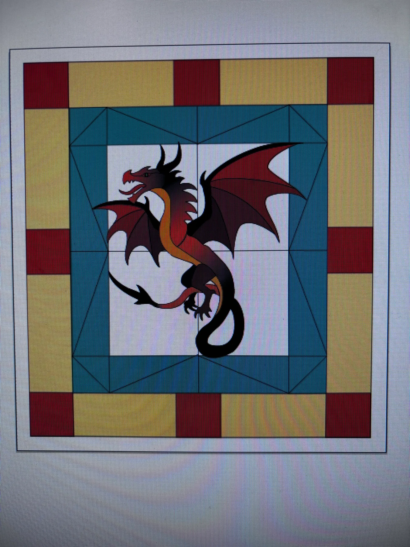 First dragon design with red wings and a teal and gold border