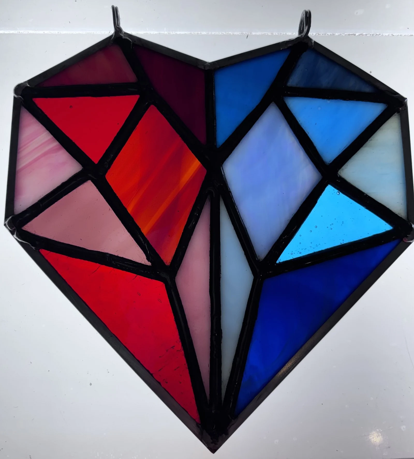Geometric heart suncatcher — original photograph