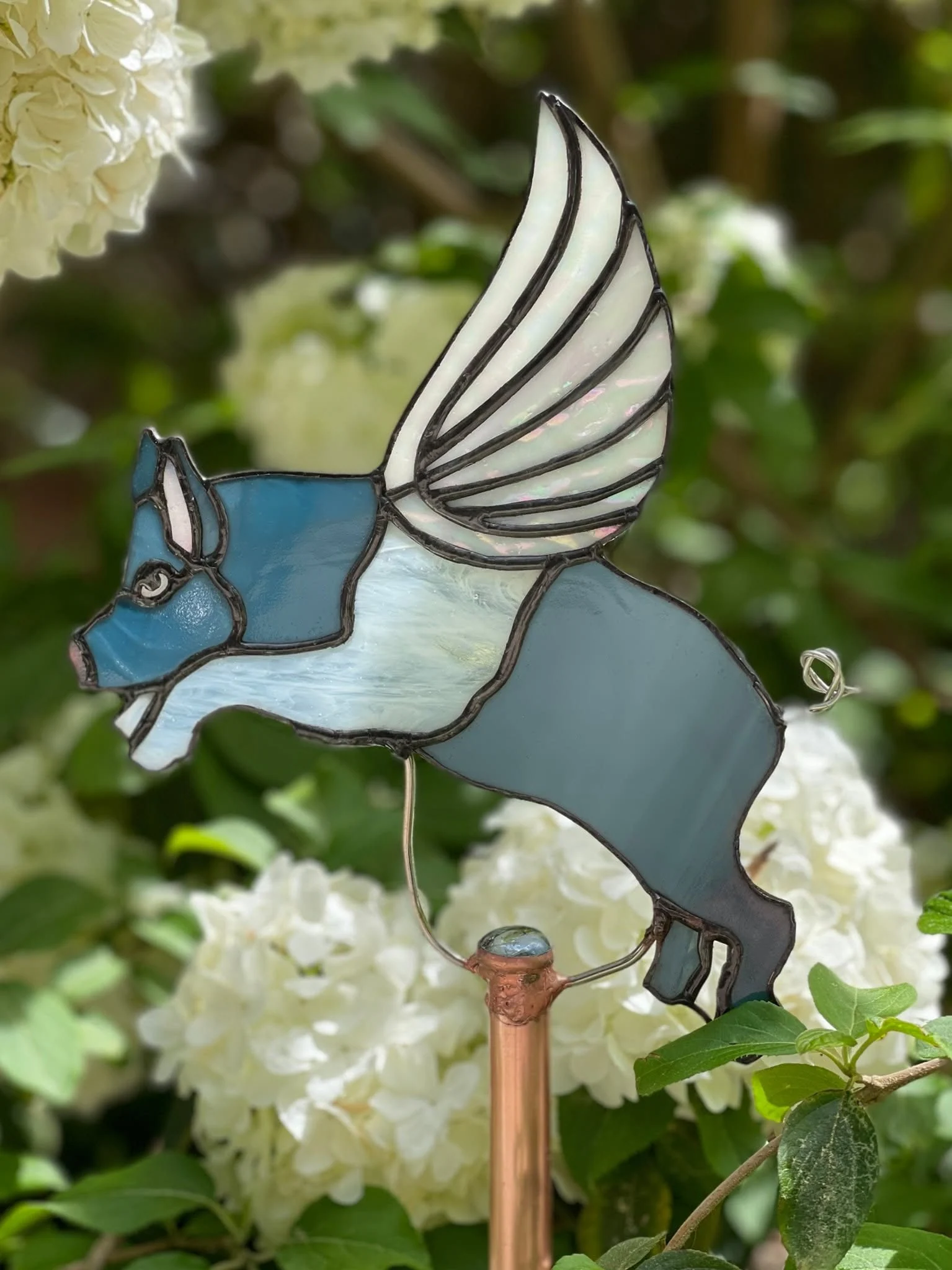 Flying pig garden stake — original photograph